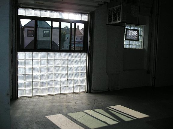 Close up living area with glass block and windows