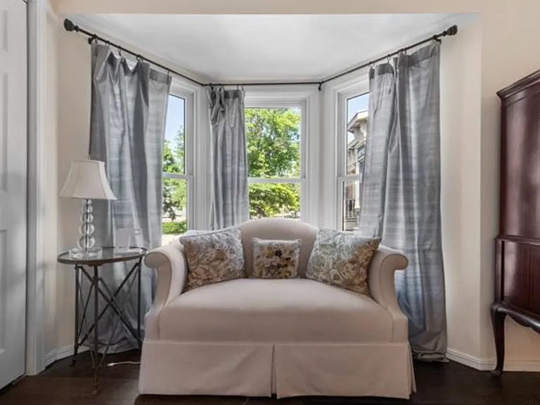 Top floor bedroom with Bay Window, private bathroom, and small private balcony