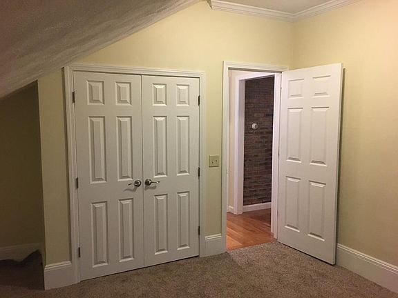 Front Bedroom with large closet and multi-level shelving