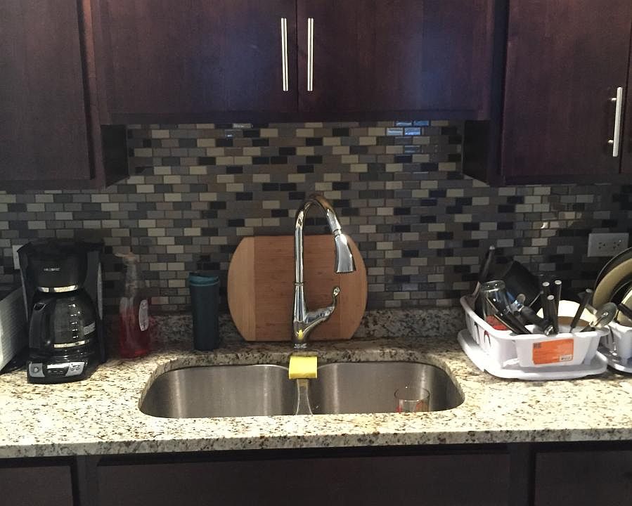 New fixtures, cabinets, backsplash and granite countertops