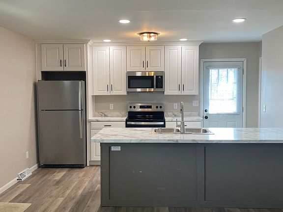 Kitchen open to living room.