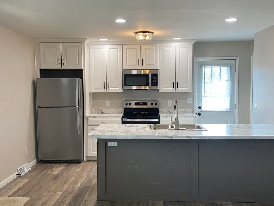 Kitchen open to living room.