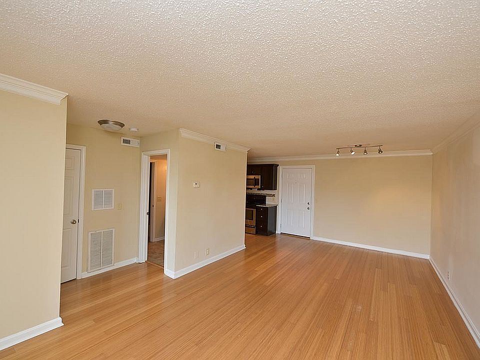 Explore this inviting open-concept living area, perfect for entertaining and relaxation.
