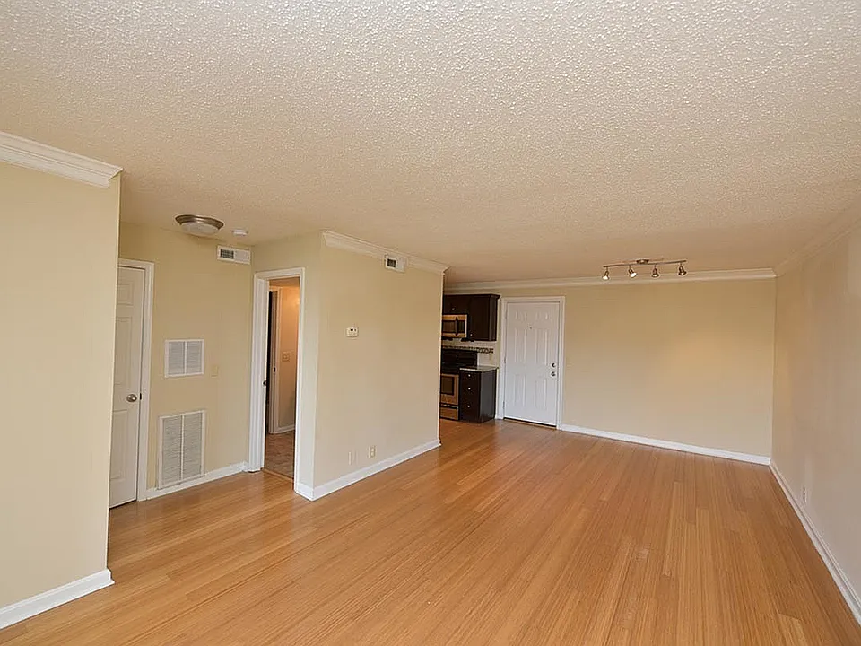 Explore this inviting open-concept living area, perfect for entertaining and relaxation.
