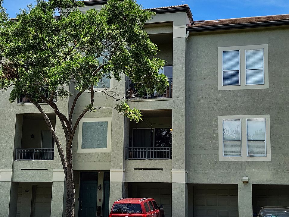 Exterior rear with balcony on 3rd level.
