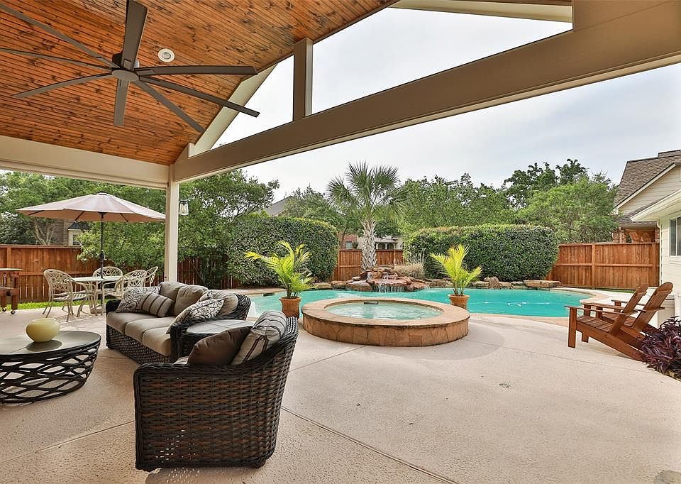 Huge 12âx20â custom patio w/ wood paneled gable features lighting and an oversized Fan! Not to mention that view!