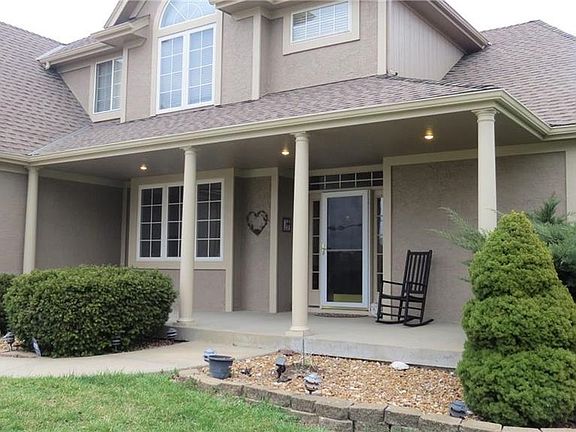 Can you imagine yourself sitting on this front porch and looking at the sunset every evening?