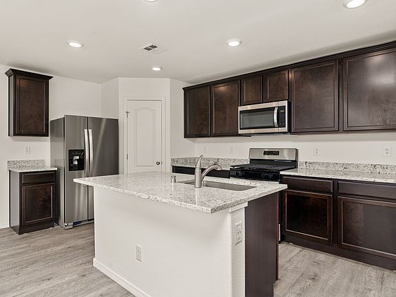 The kitchen is truly the heart of the home with stunning upgrades.