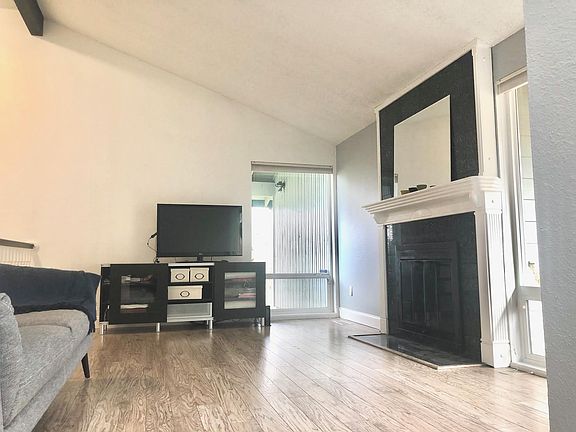 Living room with vaulted ceilings