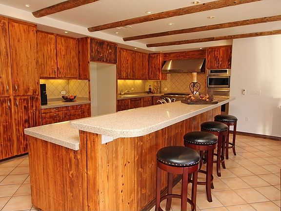 Spacious cook's kitchen w/2 sinks, custom wood cabinetry, conv oven, warmer...