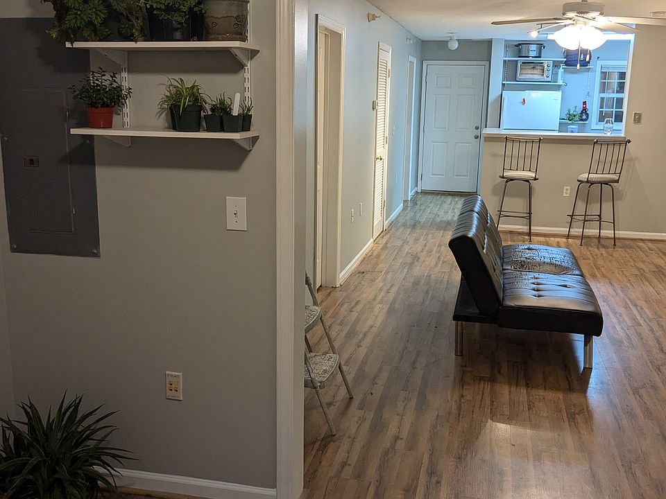 View from Den looking at kitchen and main entrance