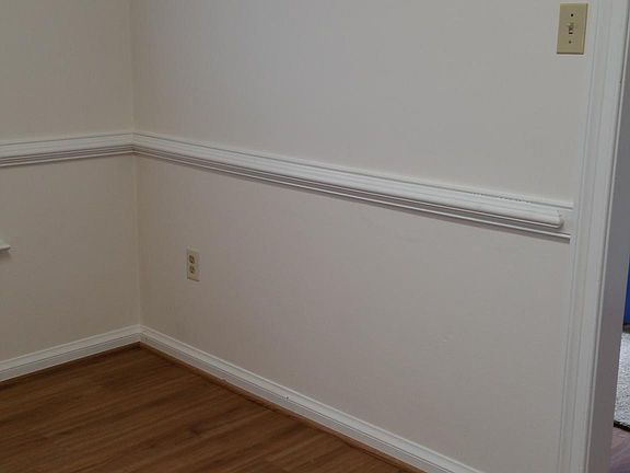 Kitchen to right of entry...AND room for a table
