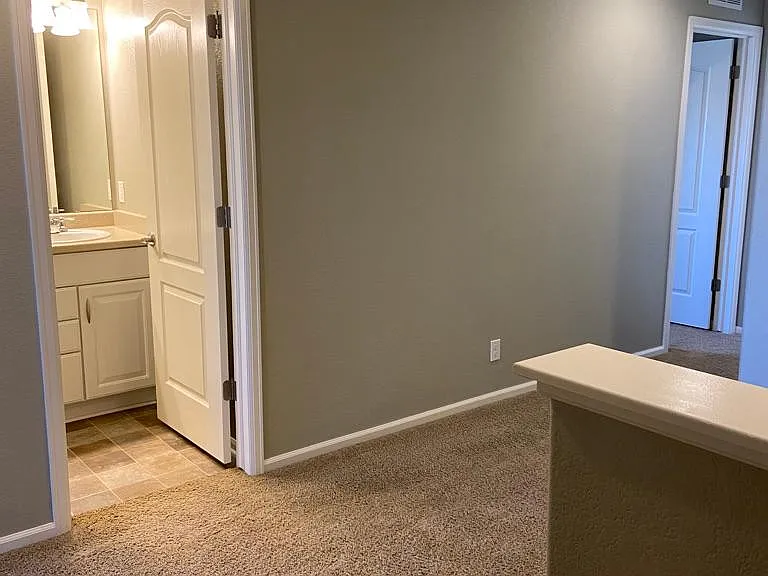 View from top of stairs to loft and hallway