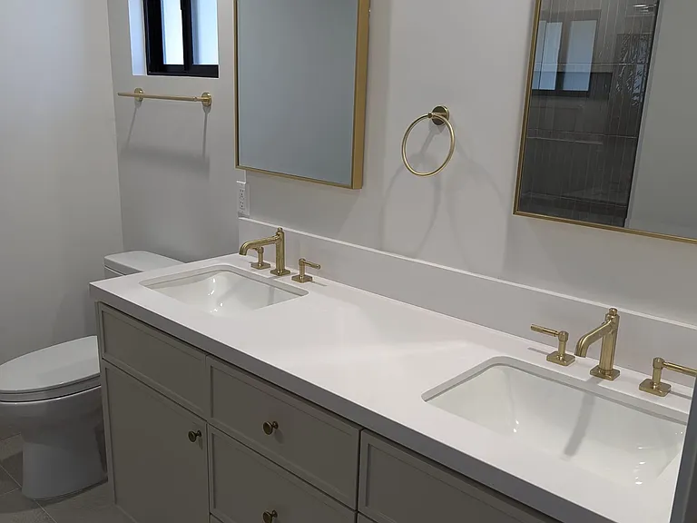 bathroom located in the 1st bedroom