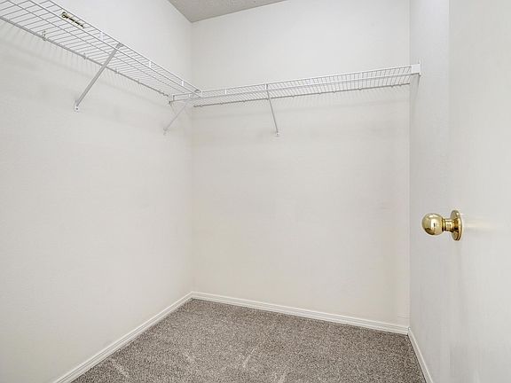 Primary Bedroom - Walk-in Closet