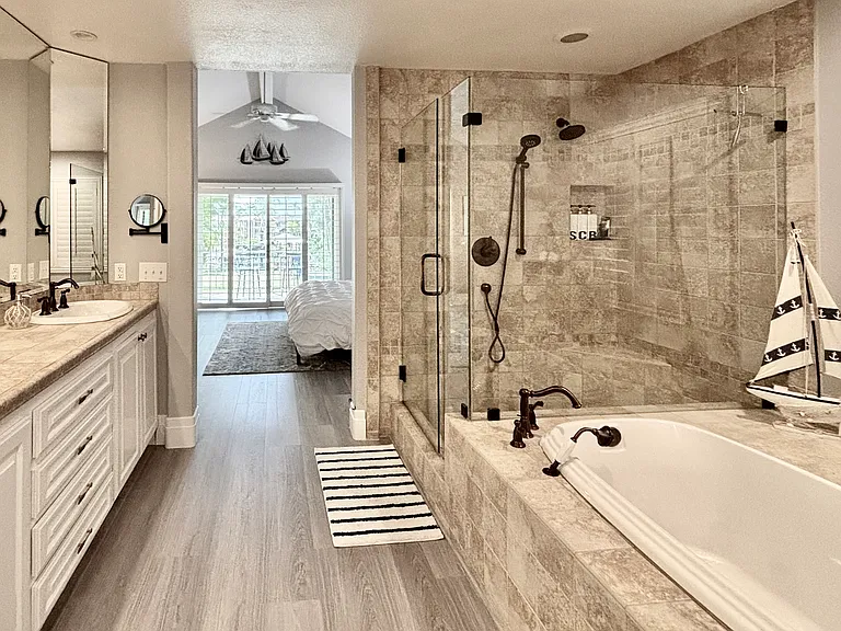 En suite bathroom to primary bedroom