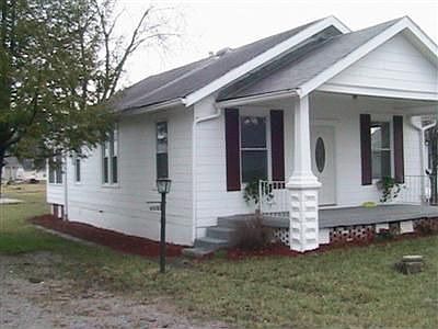 Covered front porch and drive
