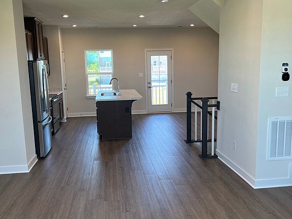 Living room toward kitchen view