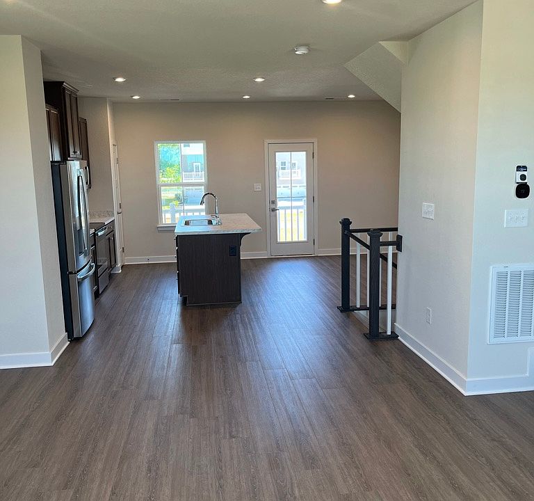 Living room toward kitchen view