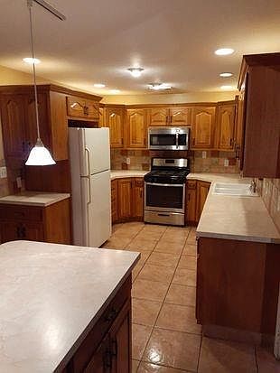 5th image of 11210 E 50th St