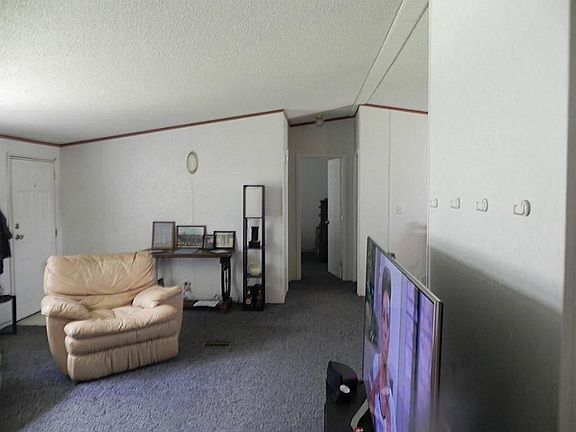 ANOTHER VIEW OF LIVING ROOM