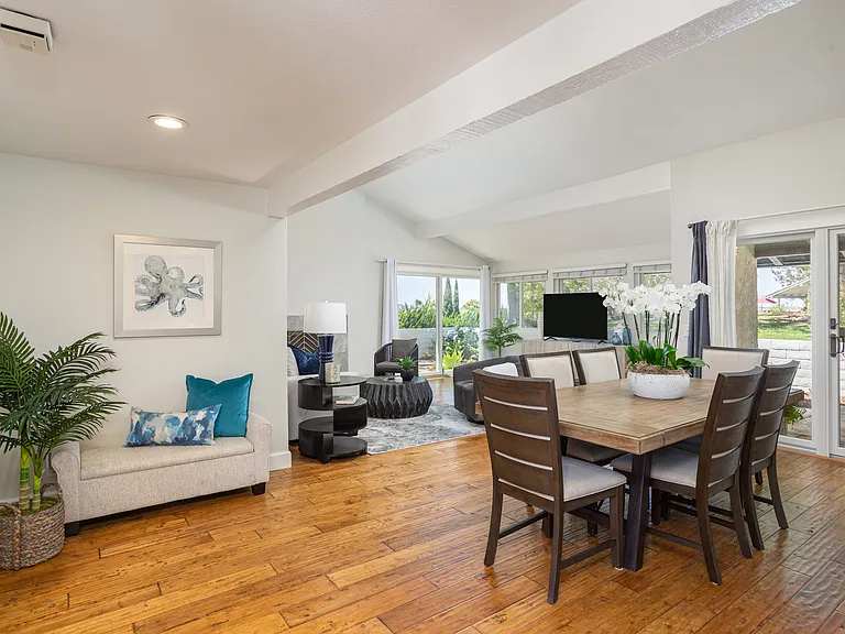 Welcome to an open and airy living space with ample windows bringing the park-like environment in.