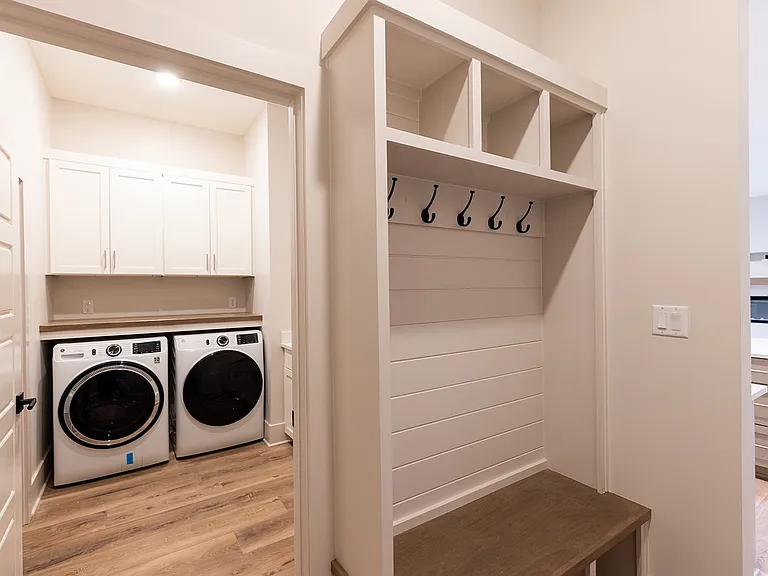 Mudroom into laundry room.