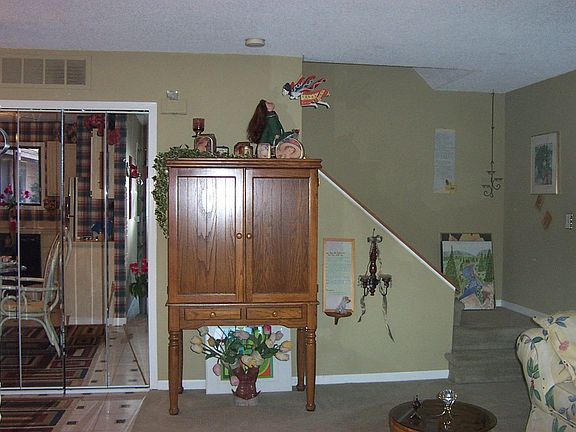 Living Room w/Stairs to Upper Level