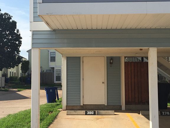 Carport with Storage Room