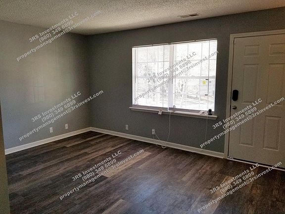 Living room, new floors, window treatments