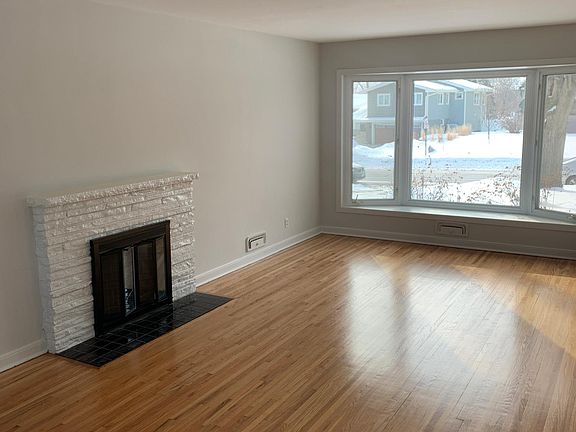 Living room with working wood fireplace