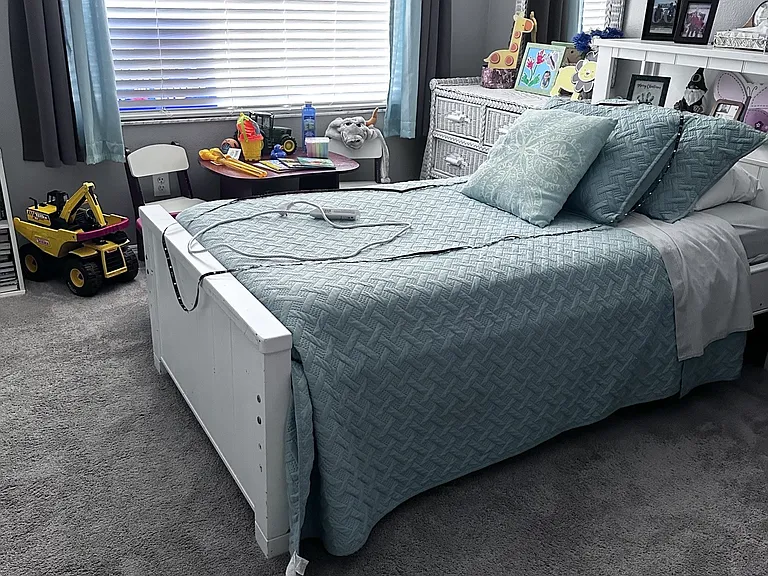 Bedroom 2 with updated carpeting and en suite bathroom