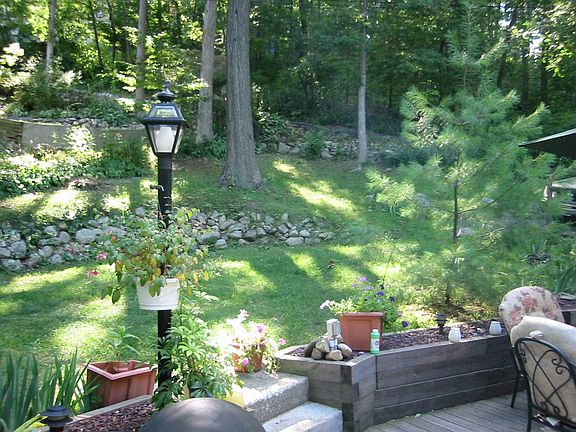 The back yard from the patio. This is where my children love to play.