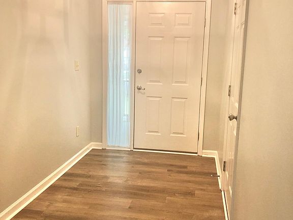 Foyer. Front door & garage entrance.