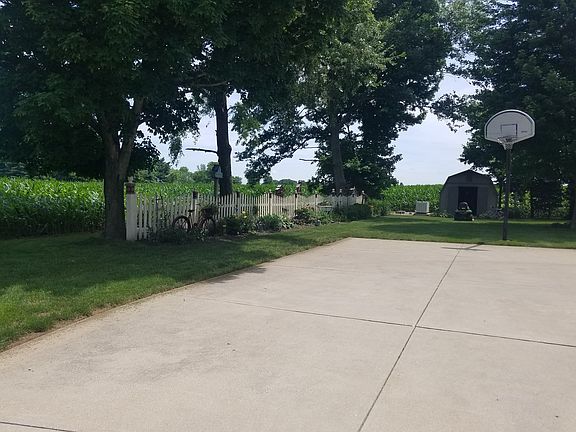 Picket fence and storage barn