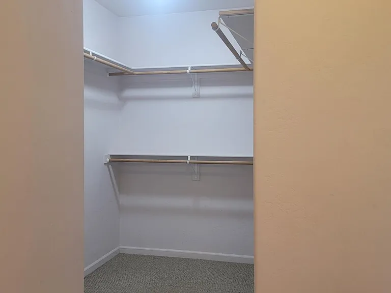 Inside master bedroom closet