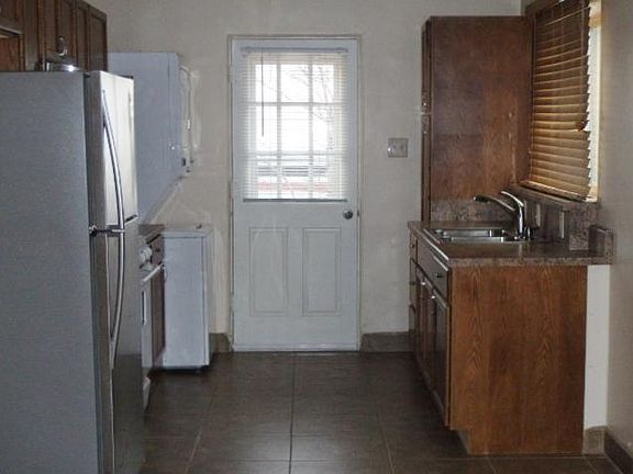 Kitchen with access to side yard