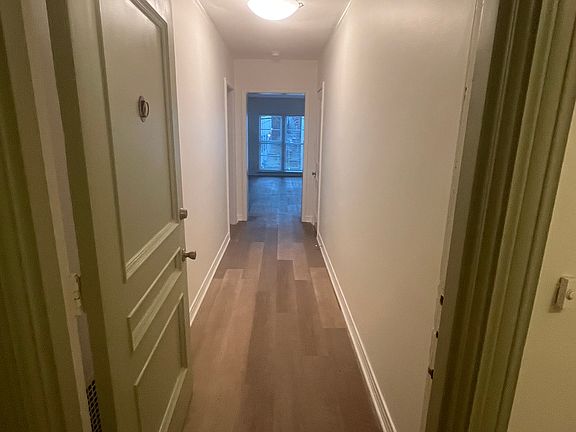 Front entrance of the apartment. The coat closet is on the right.