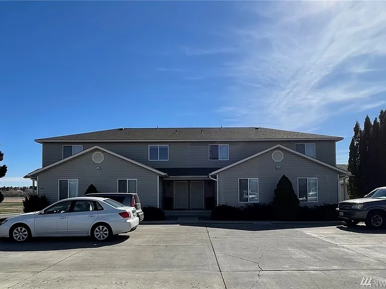Exterior of 4-Plex and parking lot