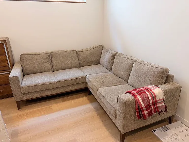 Free L Shaped couch for optimal living room space.
