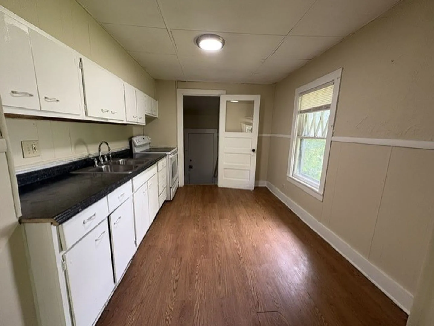 Charming 3-Bedroom Akron Home with a Covered Porch and Private Yard — Photo 4