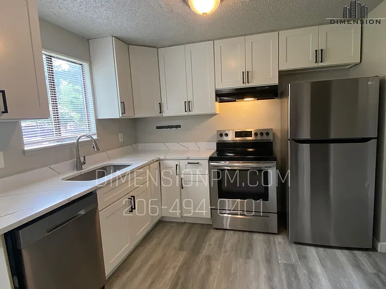 Updated Townhouse Style Apartments — Photo 3