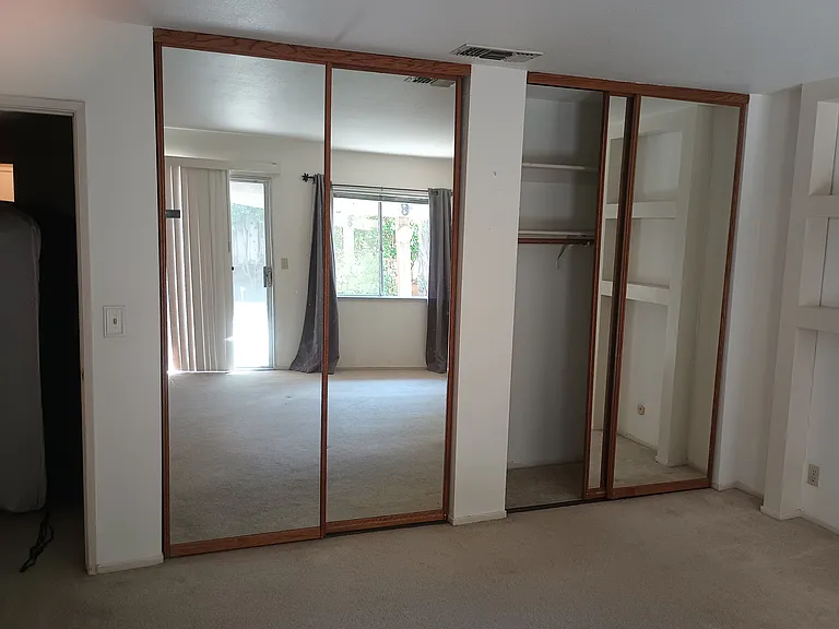 Master bedroom his and her closets