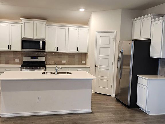 Open kitchen with large island.