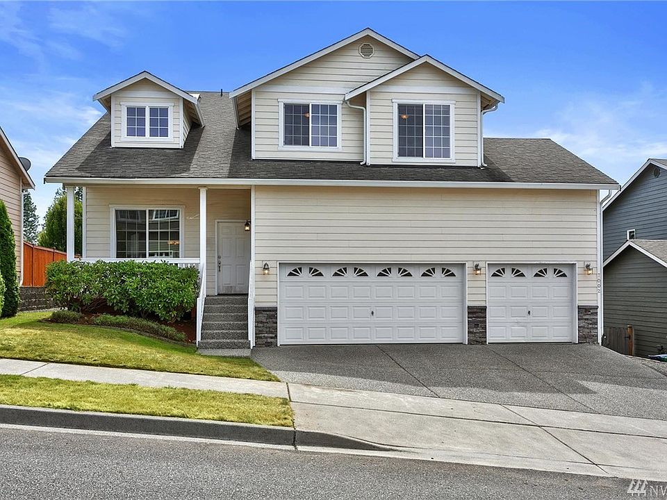 3 car garage with views of the sound.