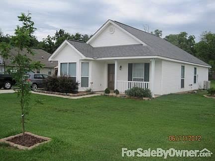 Front of house
						:
						Yard is fenced on 2 sides...getting that fenced-in yard would be a breeze!