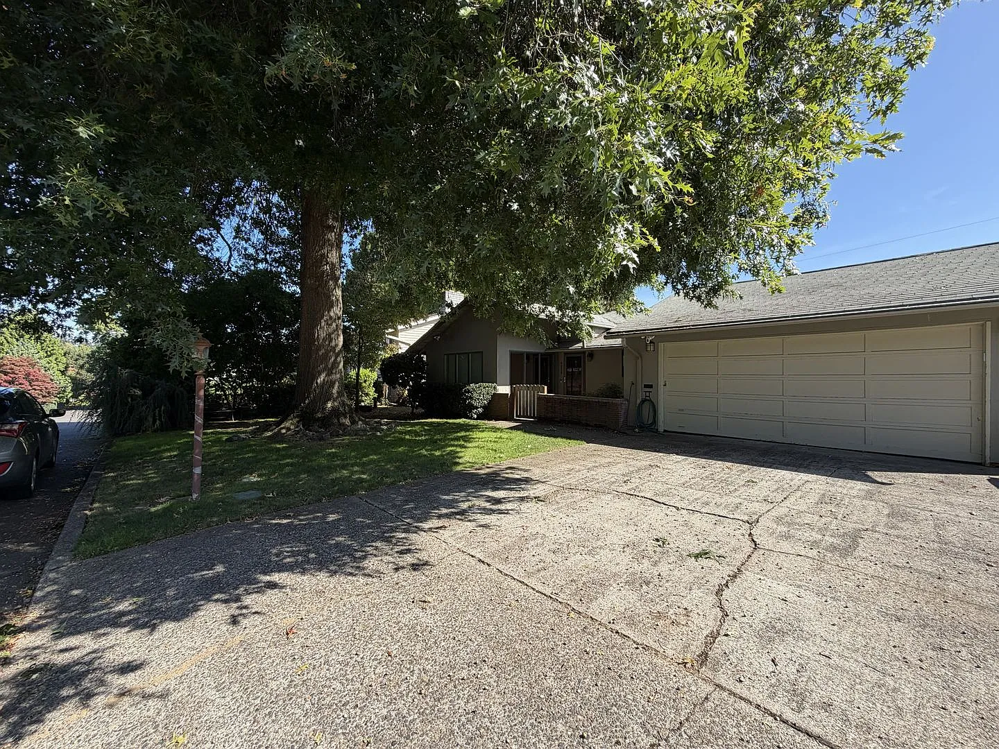 Spacious 3 Bedroom Home with Multiple Living Areas, Two Fireplaces, Hardwood Floors & Outdoor Patio — Photo 4