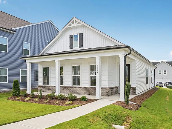 Exterior - Classic siding and a breezy coastal palette.