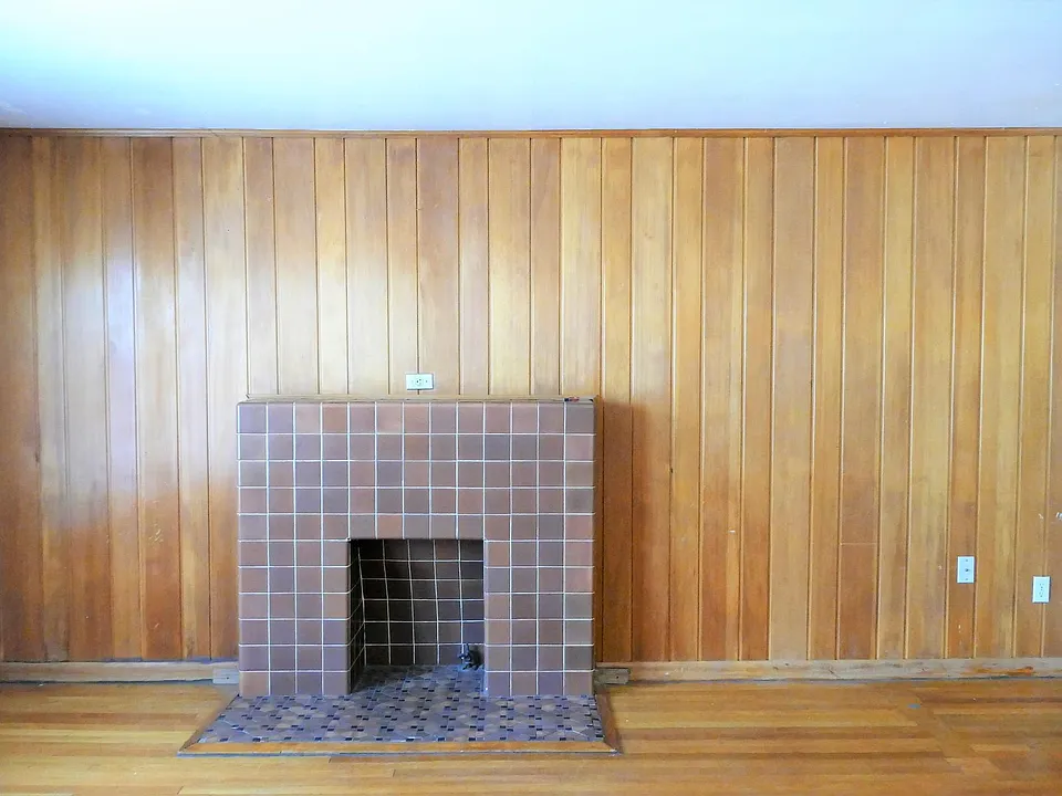 Big living room with mock fireplace
