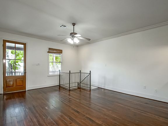 Stairwell leads to private 1st floor suite